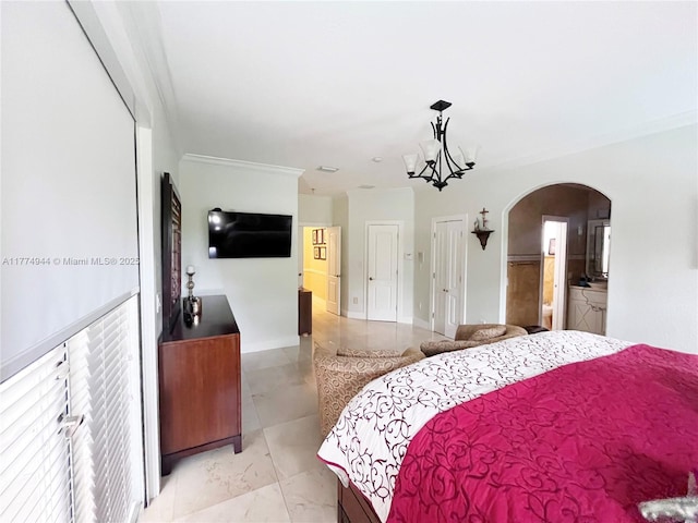 14261 SW 30th St, Miami, FL 33175 - bedroom with arched walkways, a chandelier, ensuite bath, light tile patterned floors, and baseboards