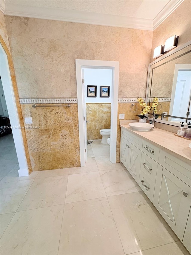 14261 SW 30th St, Miami, FL 33175 - bathroom with crown molding, double vanity, a bidet, and tile walls