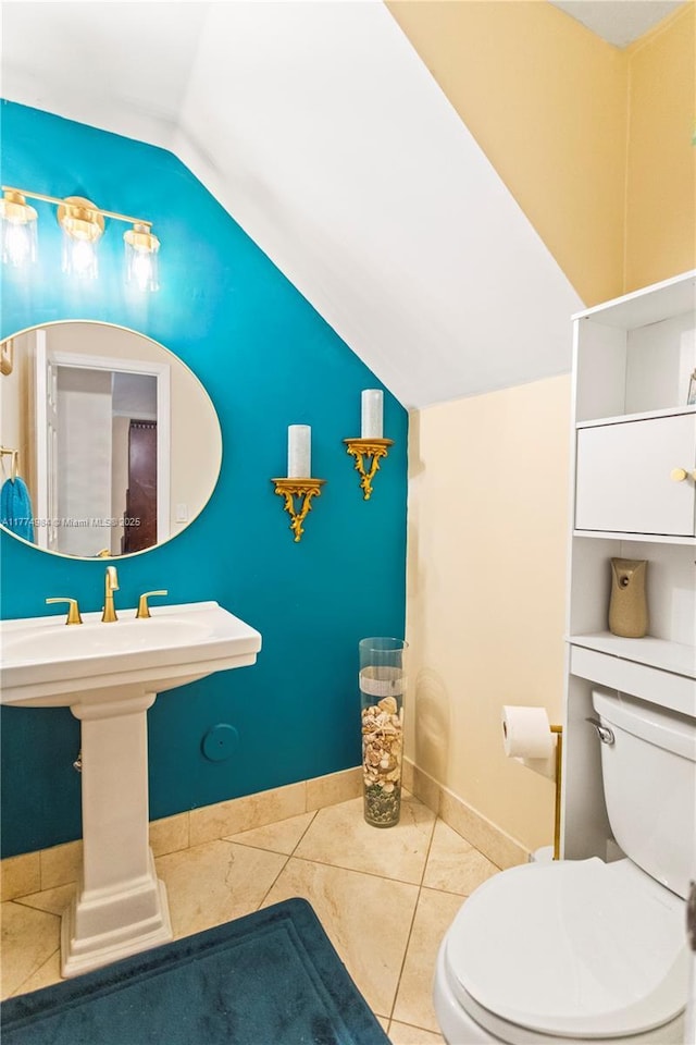 14201 Summersville Pl, Davie, FL 33325 - half bath with lofted ceiling, toilet, tile patterned floors, and baseboards