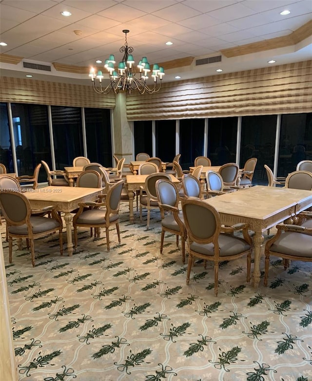 dining room featuring crown molding, an inviting chandelier, visible vents, and recessed lighting