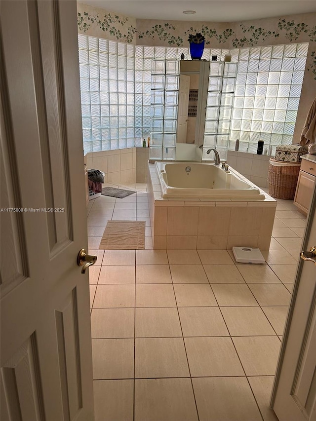 12044 NW 9th Pl, Coral Springs, FL 33071 - full bath with a tub with jets and tile patterned flooring