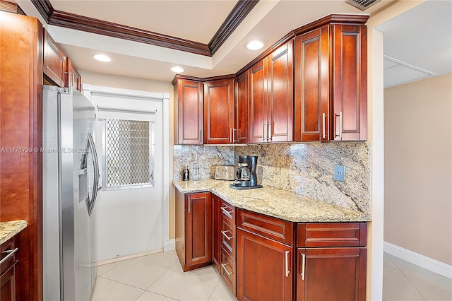 2940 N Course Dr Unit 712, Pompano Beach, FL 33069 - kitchen with crown molding, light tile patterned floors, stainless steel fridge, tasteful backsplash, and light stone countertops