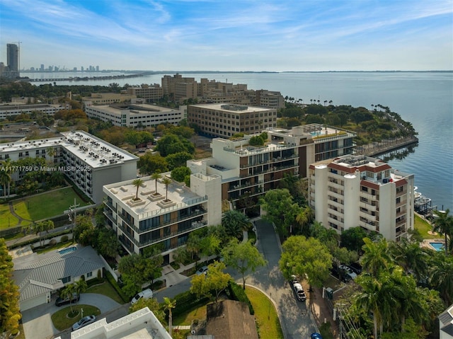 view of urban area featuring a nearby body of water