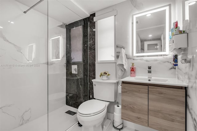 8775 Park Blvd Unit 111, Miami, FL 33172 - bathroom featuring vanity, a marble finish shower, toilet, and tile walls