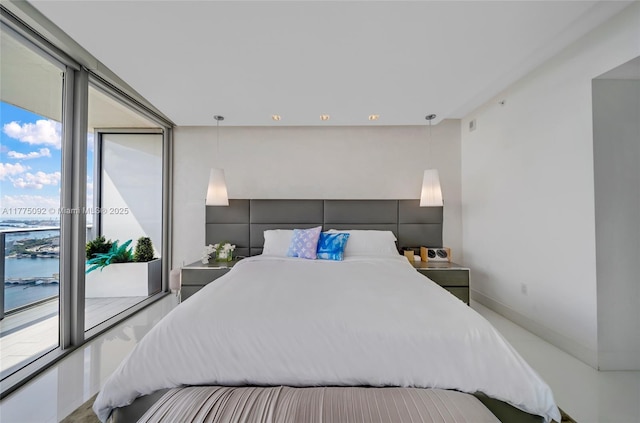 bedroom featuring baseboards