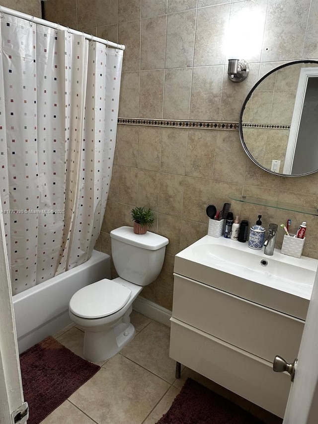 7951 SW 104th Unit 210D, Miami, FL 33156 - bathroom with tile patterned floors, shower / tub combo, toilet, vanity, and tile walls