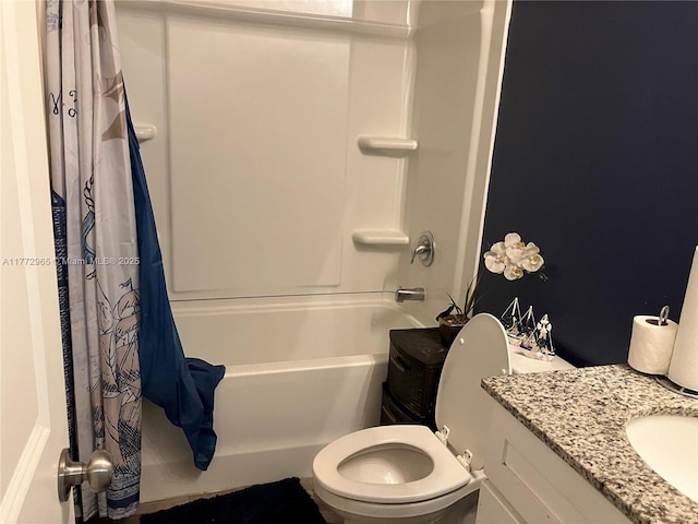 bathroom featuring toilet, shower / bath combination with curtain, and vanity