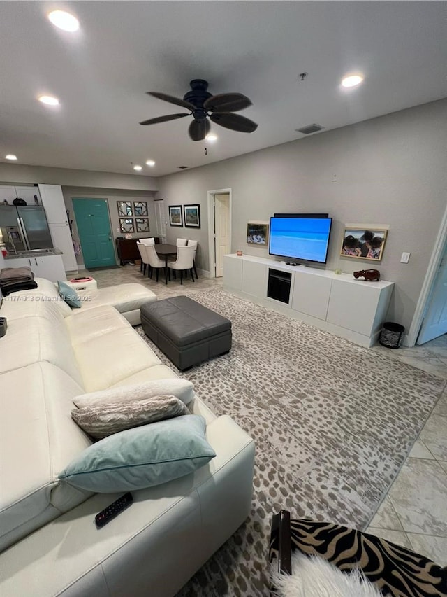 75 Gulfstream Rd Unit 211B, Dania Beach, FL 33004 - living area with recessed lighting, a ceiling fan, and light marble finish flooring