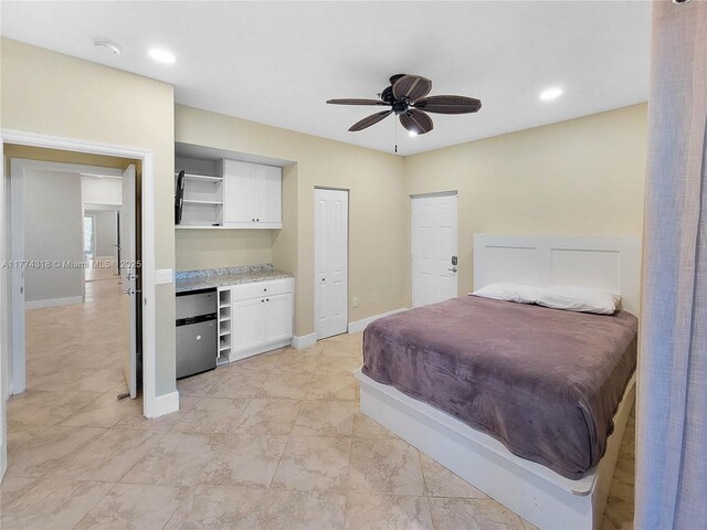 bedroom with recessed lighting, baseboards, a ceiling fan, and fridge