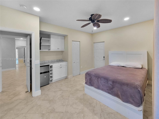 bedroom with recessed lighting, baseboards, a ceiling fan, and refrigerator