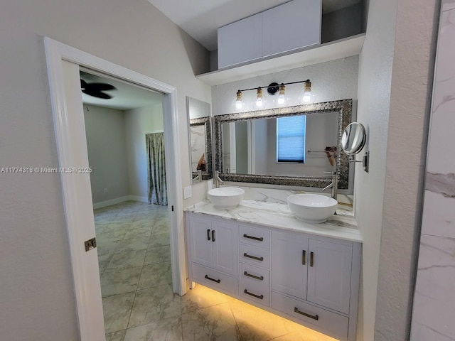 bathroom with double vanity and a sink
