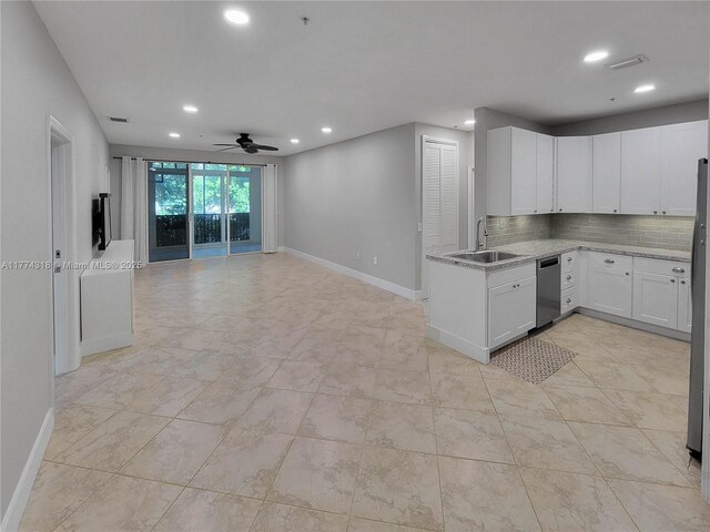 75 Gulfstream Rd Unit 211B, Dania Beach, FL 33004 - kitchen with appliances with stainless steel finishes, ceiling fan, baseboards, open floor plan, and recessed lighting
