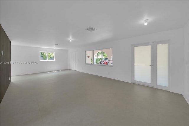 10250 SW 28th St, Miami, FL 33165 - spare room featuring finished concrete floors