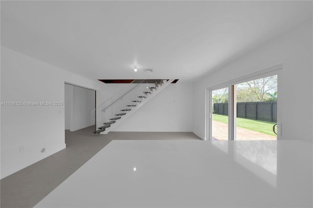 10250 SW 28th St, Miami, FL 33165 - unfurnished living room with stairway