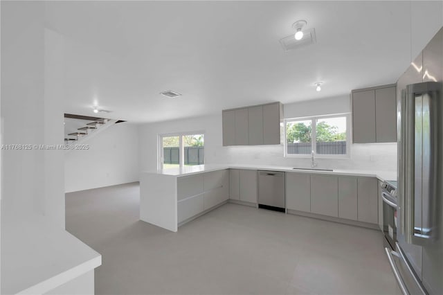 10250 SW 28th St, Miami, FL 33165 - kitchen featuring stainless steel dishwasher, gray cabinets, and modern cabinets