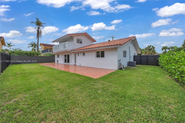 10250 SW 28th St, Miami, FL 33165 - back of house with stucco siding, a fenced backyard, and a balcony