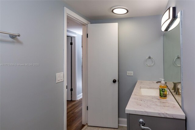 9180 W Bay Harbor Dr Unit 5C, Bay Harbor Islands, FL 33154 - bathroom featuring vanity and baseboards