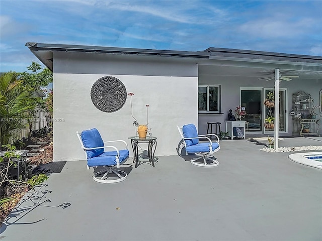 view of patio / terrace featuring a ceiling fan