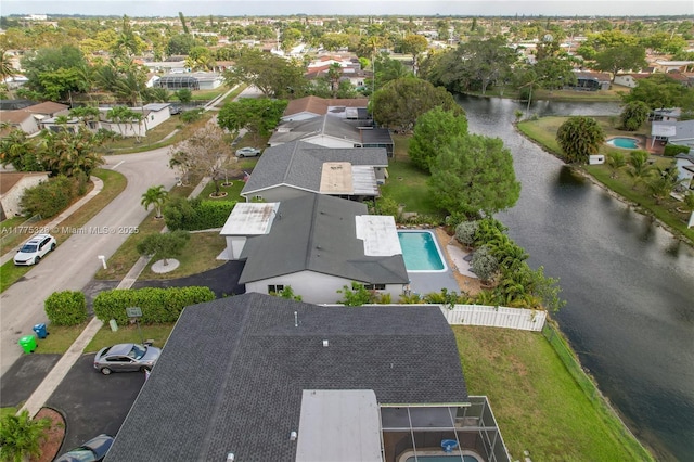 aerial view featuring a water view and a residential view