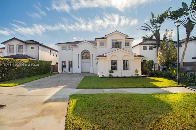 1411 SW 149th Pl, Miami, FL 33194 - view of front of house with driveway and stucco siding