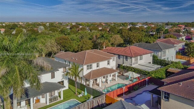 1411 SW 149th Pl, Miami, FL 33194 - aerial perspective of suburban area with a pool