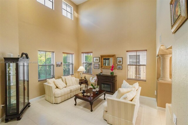 1411 SW 149th Pl, Miami, FL 33194 - living room with a high ceiling and light tile patterned flooring