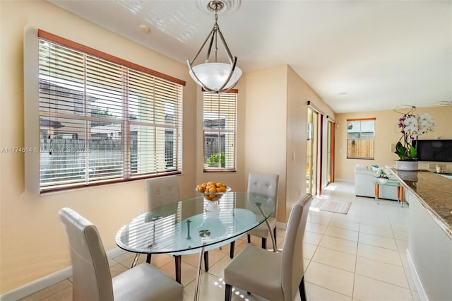 1411 SW 149th Pl, Miami, FL 33194 - dining space featuring light tile patterned flooring