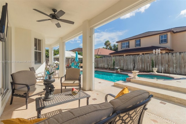 1411 SW 149th Pl, Miami, FL 33194 - view of pool featuring an in-ground hot tub, ceiling fan, a fenced backyard, a patio, and a diving board