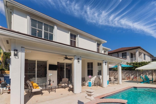 1411 SW 149th Pl, Miami, FL 33194 - back of property with a patio, stucco siding, and ceiling fan