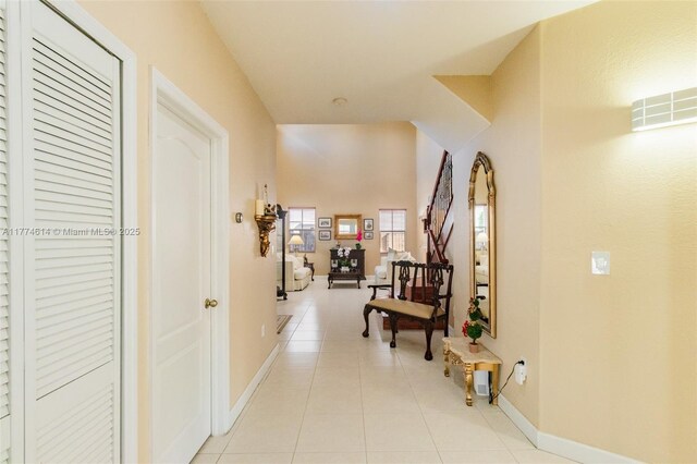 1411 SW 149th Pl, Miami, FL 33194 - hallway with light tile patterned floors and baseboards