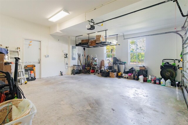 1411 SW 149th Pl, Miami, FL 33194 - garage featuring a garage door opener