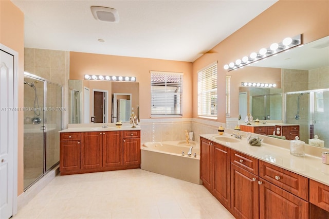 1411 SW 149th Pl, Miami, FL 33194 - bathroom with two vanities, a shower stall, a garden tub, and tile patterned floors