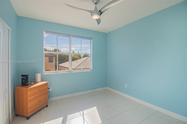 1411 SW 149th Pl, Miami, FL 33194 - empty room featuring a ceiling fan and light tile patterned floors