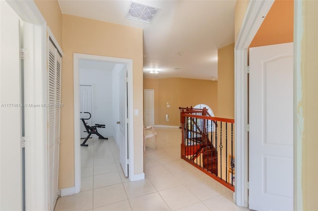 1411 SW 149th Pl, Miami, FL 33194 - hallway with an upstairs landing and light tile patterned floors