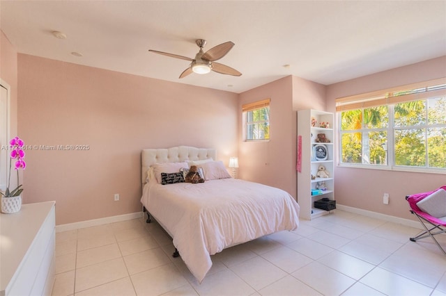 1411 SW 149th Pl, Miami, FL 33194 - bedroom with light tile patterned floors and ceiling fan