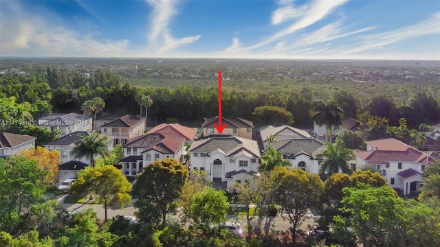 1411 SW 149th Pl, Miami, FL 33194 - aerial perspective of suburban area with a heavily wooded area