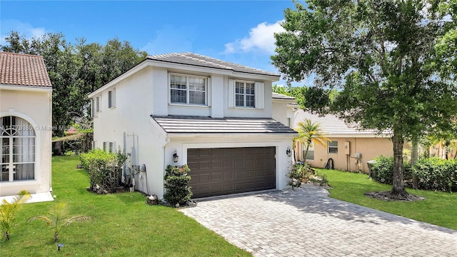 10766 Crescendo Cir, Boca Raton, FL 33498 - traditional-style home featuring a garage, stucco siding, decorative driveway, and a front lawn