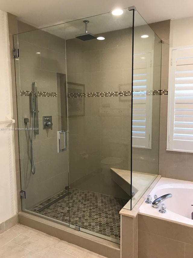 10766 Crescendo Cir, Boca Raton, FL 33498 - bathroom featuring a garden tub, a stall shower, tile patterned floors, and recessed lighting