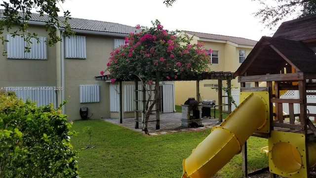 10766 Crescendo Cir, Boca Raton, FL 33498 - view of play area with a patio area