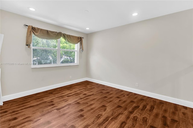 10766 Crescendo Cir, Boca Raton, FL 33498 - unfurnished room featuring baseboards, wood finished floors, and recessed lighting