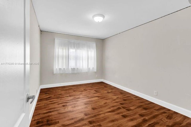 10766 Crescendo Cir, Boca Raton, FL 33498 - spare room with baseboards and wood finished floors