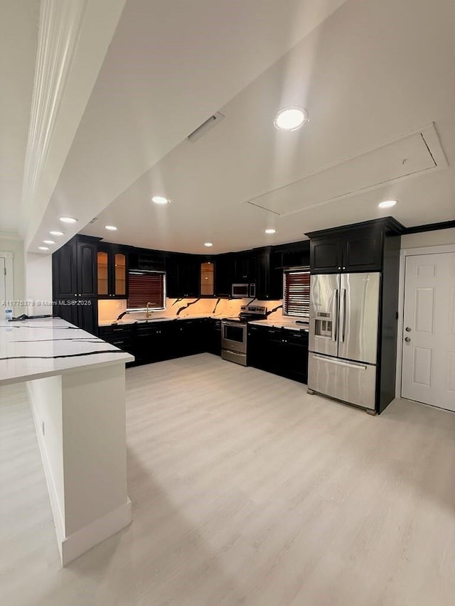 4529 SW 24th St, Fort Lauderdale, FL 33317 - kitchen with dark cabinetry, recessed lighting, and stainless steel appliances