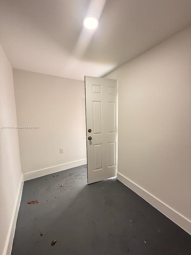 4529 SW 24th St, Fort Lauderdale, FL 33317 - empty room featuring concrete flooring and baseboards