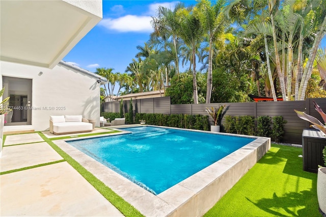 view of pool featuring a patio area, a fenced backyard, a fenced in pool, and a lawn