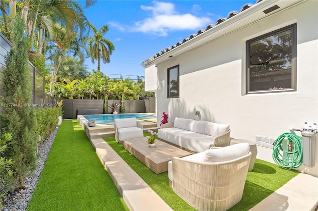 view of patio / terrace featuring a fenced in pool, an outdoor living space, a fenced backyard, and visible vents
