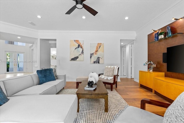 1427 Victoria Isle Dr, Weston, FL 33327 - living area featuring crown molding, french doors, light wood-style floors, a ceiling fan, and recessed lighting