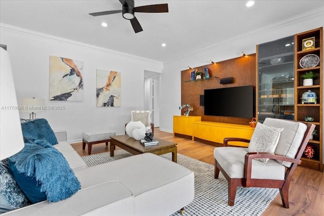 1427 Victoria Isle Dr, Weston, FL 33327 - living area with ceiling fan, ornamental molding, wood finished floors, recessed lighting, and baseboards