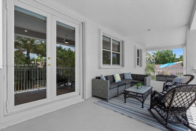 1427 Victoria Isle Dr, Weston, FL 33327 - view of patio / terrace featuring french doors and outdoor lounge area