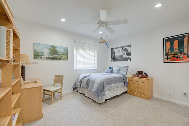 bedroom featuring light colored carpet, baseboards, and recessed lighting