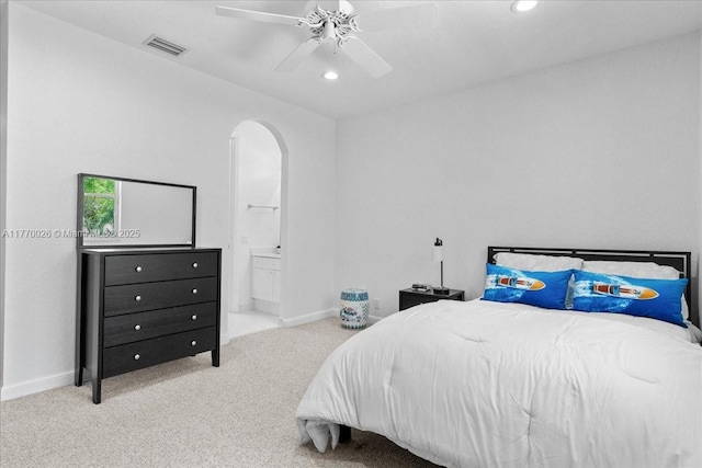 1427 Victoria Isle Dr, Weston, FL 33327 - bedroom featuring arched walkways, carpet flooring, recessed lighting, baseboards, and ensuite bathroom